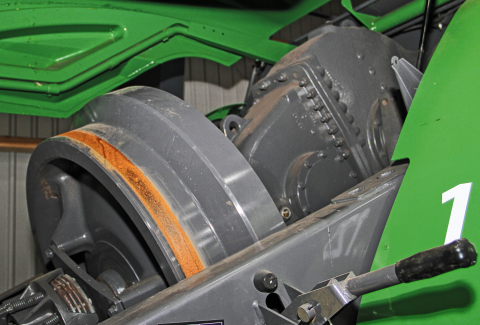 Close-up of the flywheel on the Fendt 1290 XD baler.