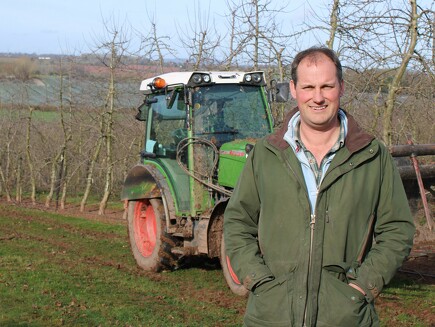 Richard Hibbard, Manager of E.C. Dummomd in front of a Fendt 200 Vario