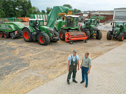 Björn Kaiser and Heribert Glaßl in front of their Fendt machines.