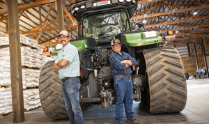 2 Farmers in front of the Fendt Track Tractor